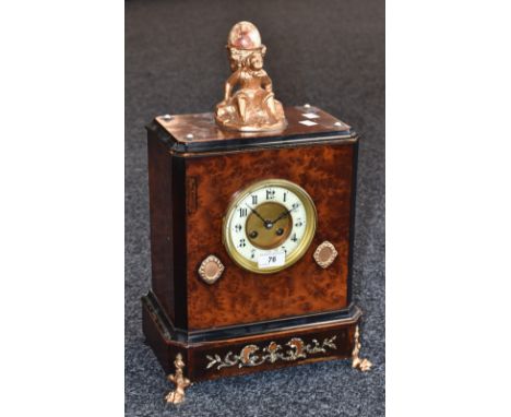 A Jappy Freres burr walnut bracket clock surmounted by a  gilt metal figure bearing a mineral sample egg, enamelled chapter r