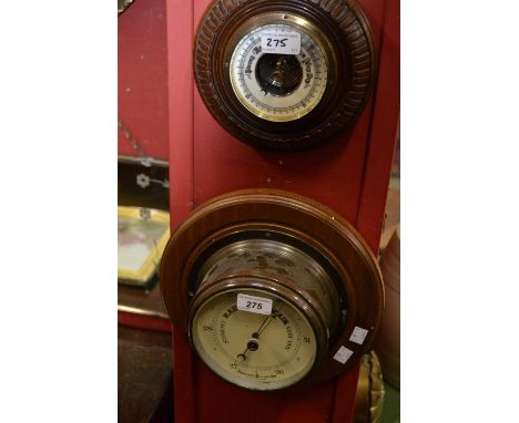 A ship's barometer; another aneroid barometer.(2)