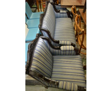 An Edwardian mahogany salon suite, two set sofa and two armchairs 