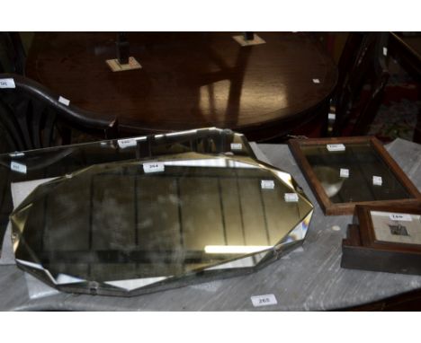An Art Deco shaped wall mirror, another; a wall barometer, etc (4)