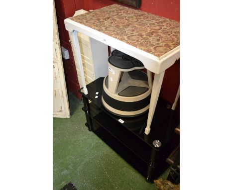 A painted mahogany folding table with reversible top; a 1920's painted side cabinet, shelf over cupboard and six drawers; a K