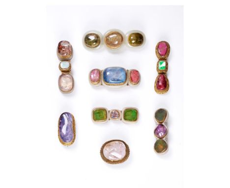 EIGHT VARIOUS CHINESE GILT-COPPER MOUNTED SEMI-PRECIOUS STONE AND JADEITE BUCKLES/BROOCHESQING DYNASTY, 19TH CENTURYComprisin