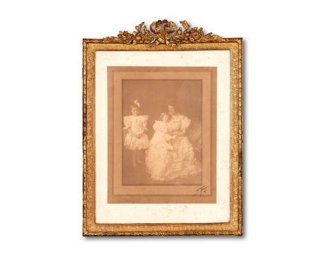 PHOTOGRAPHS:  THE DOBLE FAMILY.  a group of six framed photographs, 1907- 1930s.  comprises:  Georgie, Frances, and Georgia D