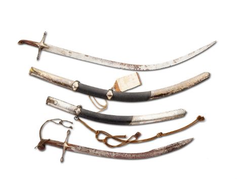 TWO SIMILAR OTTOMAN MAMELUKE SABRES19TH CENTURYEach with leather and white metal mounted scabbards, each with Rhinoceros horn