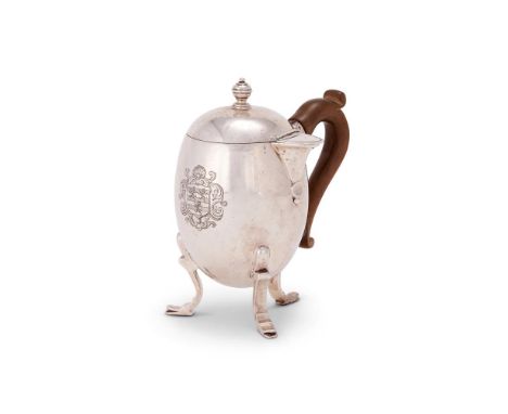 A BRITANNIA STANDARD SILVER OVIFORM HOT MILK JUG BY CRICHTON BROS (LIONEL ALFRED CRICHTON)LONDON 1915 With a turned ball fini