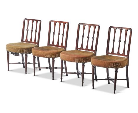 A SET OF EIGHT GEORGE III MAHOGANY DINING CHAIRSCIRCA 1810, IN THE MANNER OF THOMAS CHIPPENDALEEach with vertical splats with