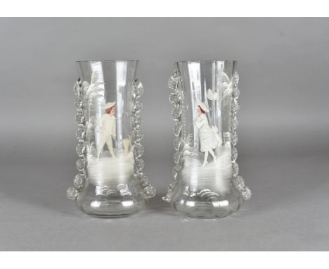 Mary Gregory type glass vases, with trails, and hand painted enamel scenes of children catching butterflies, 23.6 cm high (2)