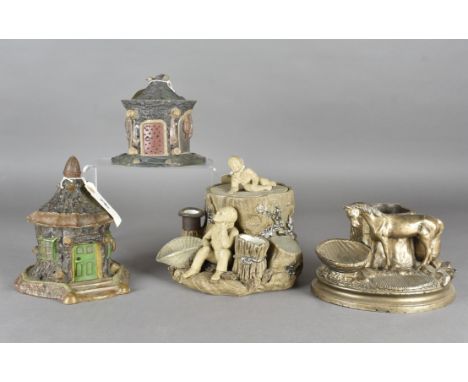 Tree trunk pattern tobacco jars, one modelled with a seated figure between two baskets and with reclining figure pattern fini