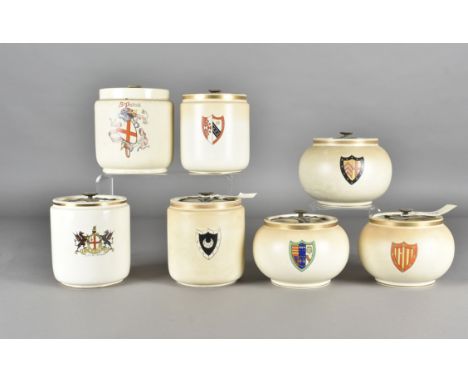 Carlton Ware tobacco jars, by Colin Lunn, Crispin & Co and Bacon Bros, all with screw lids and decorated with crest motifs (7
