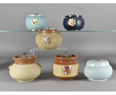 Three Carlton Ware tobacco jars, blue glaze with screw lids and coloured crests, one stamped 'John Kittridge on the underside