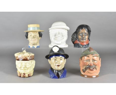 Selection of tobacco jars modelled as figures' heads, including a Bernard Bloch model of a boy with straw hat, marked 8125, a