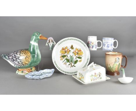 A collection of British and Continental ceramics, including a Broadhurst Happy Days butter dish and cover, a large duck turee