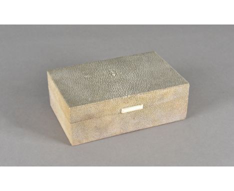 A shagreen cigarette box, with ivory button, 17 cm wide x 6 cm high x 11 cm deep 