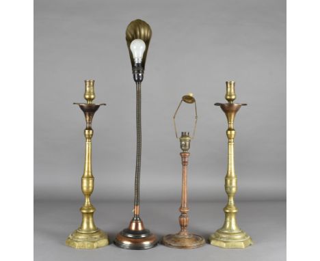 An Art Deco gooseneck desk lamp,  with a copper base and brass clamshell shade, together with a wooden table lamp and two bra