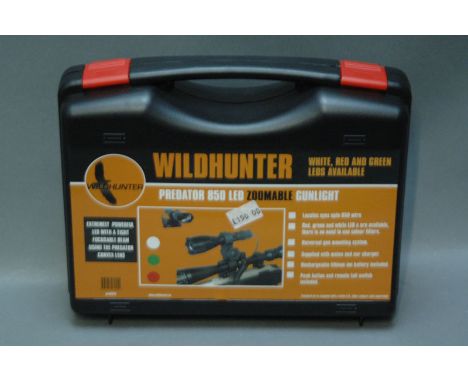 Wild Hunter 850 LED gun light, white, red and green LEDs, boxed, new. 