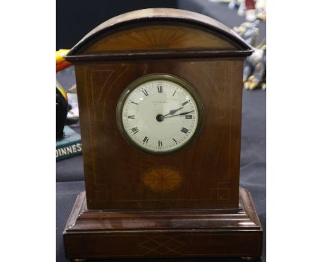 Edwardian inlaid mahogany mantel clock raised on a plinth base, height 29cm. Not available for in house P+P.