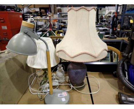 Three table lamps, including an onyx and brass example. All electrical items in this lot have been PAT tested for safety and 