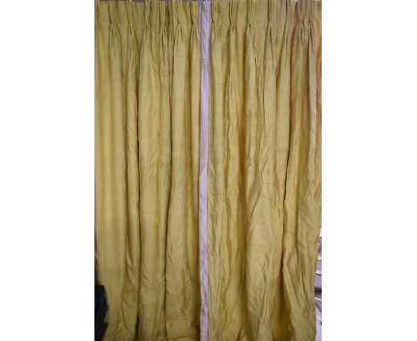 A pair of bright yellow silk pinch pleated interlined curtains. H.318 W.105cm 