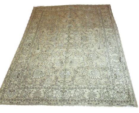 TABRIZ CARPET, 350cm x 265cm, allover design of palmettes and scrolling vines on an old gold field within a corresponding fie