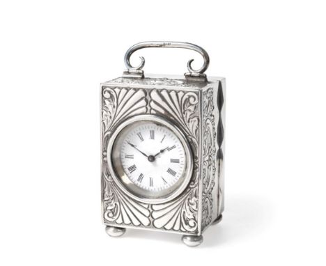 A Late Victorian Silver Bedside or Boudoir Timepiece, maker's mark GB, Birmingham 1899, the rectangular case with foliate and