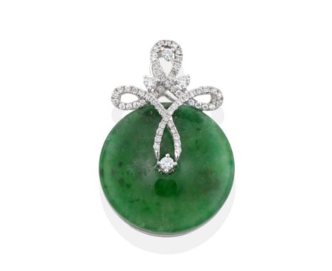 A Jade and Diamond Pendant, a jade bi mounted by a diamond set scroll bail, stated diamond weight 0.31 carat, measures 2.7cm 