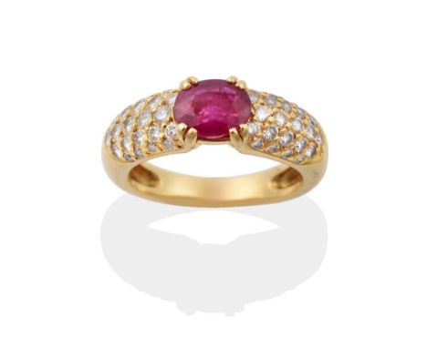 A Ruby and Diamond Ring, an oval cut ruby in a double claw setting, to pavé set diamond shoulders, total estimated diamond we