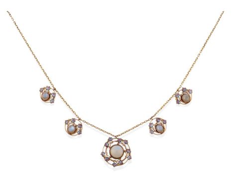 An Arts &amp; Crafts Moonstone and Enamel Necklace,&nbsp;Attributed to Jessie M. King, a central pendant with a round cut moo