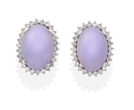 A Pair of Lavender Jade and Diamond Cluster Earrings, oval lavender jade within borders of round brilliant cut diamonds, tota