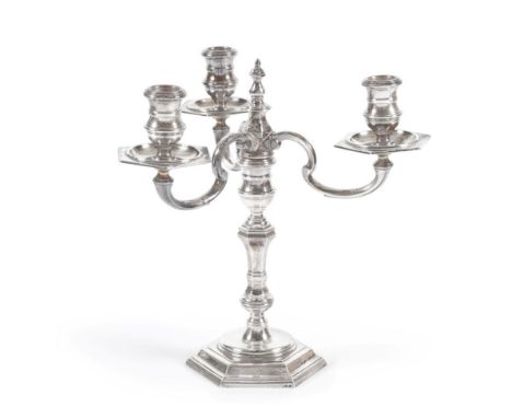 A Cast Silver Three Light Candelabra of 18th Century Style, William Comyns &amp; Sons, London 1957, with spool shaped nozzles