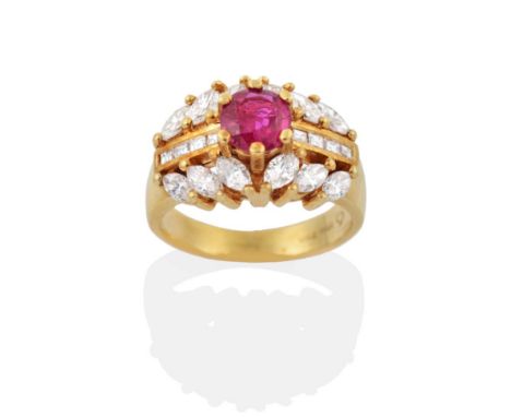A Ruby and Diamond Ring, a round cut ruby between bands of channel set princess cut diamonds and marquise cut diamonds, total
