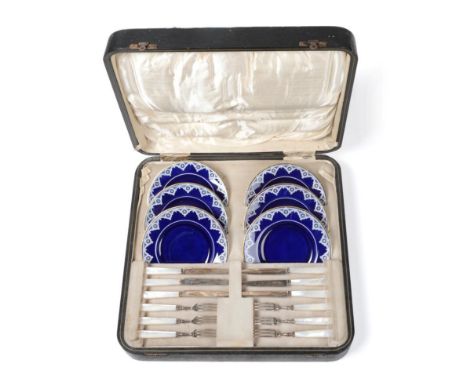 A George V Silver and Porcelain Fruit Service, the silver Martin, Hall &amp; Co, Sheffield 1924, the plates Royal Worcester, 