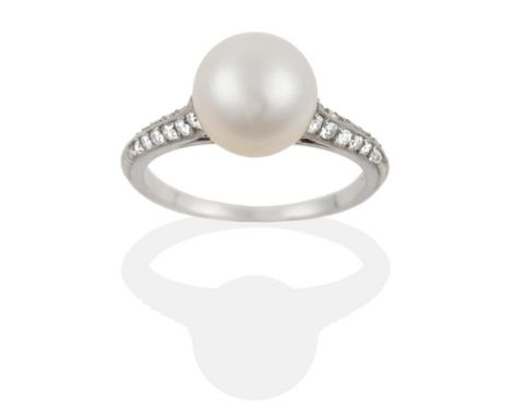 An Early Twentieth Century Pearl and Diamond Ring by Whiteside &amp; Blank, a single cultured pearl tension set to tapering d