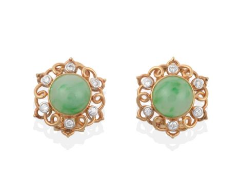 A Pair of Jade and Diamond Earrings, round jade within scrolling frames set with round brilliant cut diamonds, total estimate