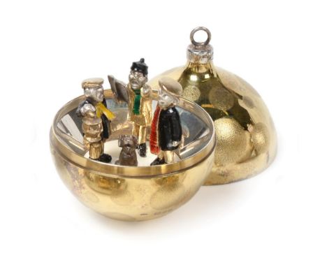 Stuart Devlin: A Parcel Gilt Silver Surprise Christmas Bauble, London 1981, the interior with a group of carol singers, numbe