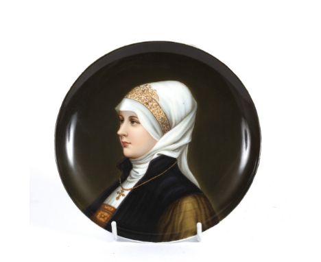 A LATE 19TH/EARLY 20TH CENTURY AUSTRIAN PORCELAIN CABINET PLATE, painted with a portrait of a young nun, 18.5cm diameter