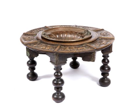 A LATE 18th CENTURY SPANISH BRAZIER TABLE, walnut top with engraved sectional bullfighting scenes, incised crescent moon shap