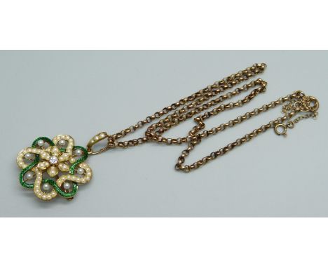 A yellow metal pendant with guilloche green enamel border, half seed pearls and a central diamond, on a 9ct gold belcher chai