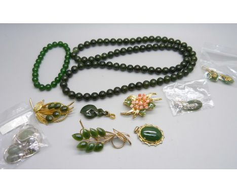 A jade bead necklace, bracelet, brooches, pendants, etc. 