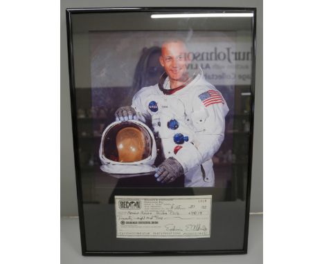 A Buzz Aldrin signed cheque display Edwin E. Aldrin with Certificate of Authentication, 2nd person to walk on the moon 