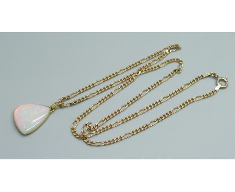 An 18ct gold opal set pendant on a 9ct gold figaro chain, 9.2g, 51cm 