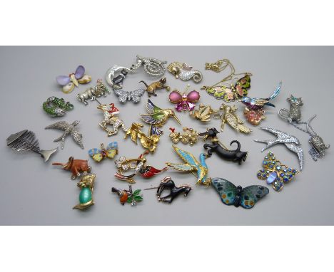 Vintage brooches including sphinx and enamelled 