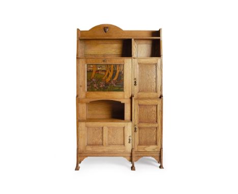 SHAPLAND &amp; PETTER, BARNSTAPLE  ARTS &amp; CRAFTS OAK SECRETAIRE BOOKCASE, CIRCA 1900   the arched ledge back with inset h