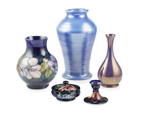 MOORCROFT POTTERY  'CLEMATIS' PATTERN FLARED VASE, CIRCA 1930   20cm high; a SELF-COLOURED TAPERED VASE, 28cm high; a SELF-CO