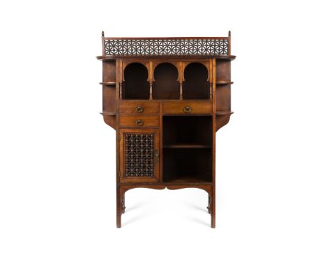 ATTRIBUTED TO LEONARD WYBURD FOR LIBERTY &amp; CO., LONDON  ANGLO-MORESQUE MAHOGANY CABINET, CIRCA 1900   with fretwork upsta