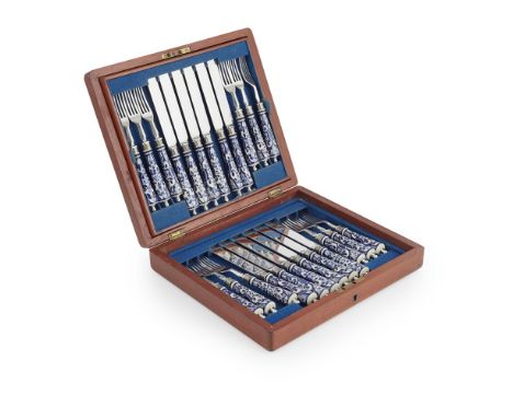 MANNER OF LEWIS F. DAY  AESTHETIC MOVEMENT CANTEEN OF FRUIT KNIVES AND FORKS, CIRCA 1870   comprising 12 knives and 12 forks,