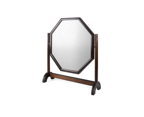 MANNER OF HEAL &amp; SON LTD., LONDON  ARTS &amp; CRAFTS MAHOGANY AND EBONISED DRESSING MIRROR, CIRCA 1920   the octagonal mo