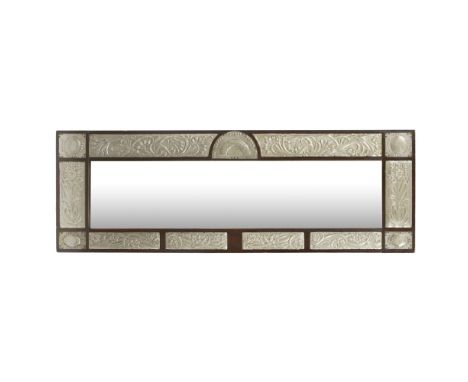 MANNER OF LEWIS F. DAY  ARTS &amp; CRAFTS PEWTER FRAMED WALL MIRROR, CIRCA 1900   with stained wood frame set with metal pane