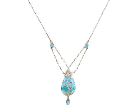 MURRLE BENNETT &amp; CO.  ART NOUVEAU SILVER AND ENAMEL PENDANT, CIRCA 1900   designed as a stylised tree of life, with oval 