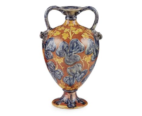 ARTHUR E. BELLS FOR DELLA ROBBIA POTTERY, BIRKENHEAD  TWIN-HANDLED BALUSTER VASE, CIRCA 1900   decorated with shamrocks, inci