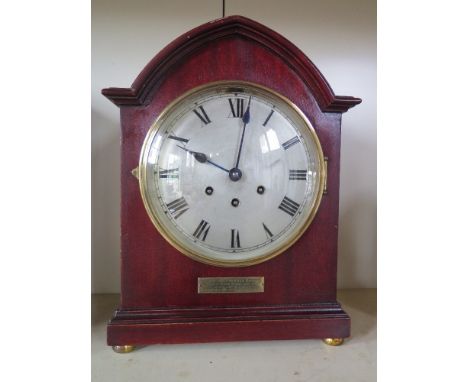 A 19th century cased Westminster chime mantel clock, Roman numerals to silvered dial above presentation plaque 